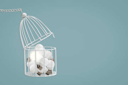 Many Lamp bulb in white bird cage isolated on blue background, minimal idea concept.の写真素材
