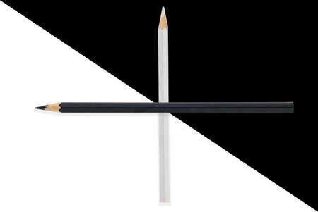 Flat lay black and white pencils on same colors background. idea minimal concept.の写真素材