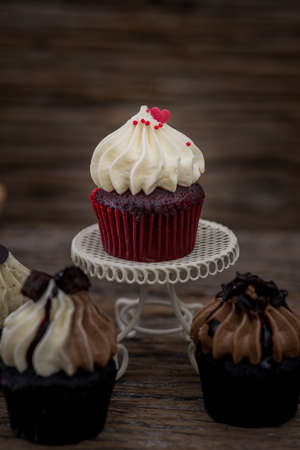 Tasty cupcakes Homemade  muffin  with cream buttercream for birthday, valentine, and christmas holliday.の写真素材