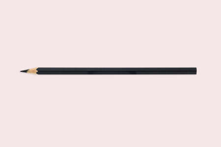 Flat lay black pencil on pink color background. idea minimal concept.の写真素材