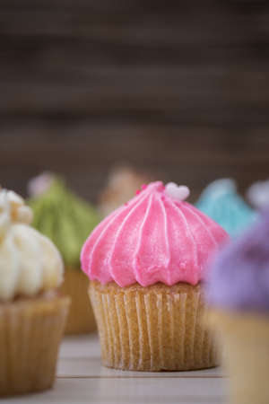 Tasty cupcakes Homemade  muffin  with cream buttercream for birthday, valentine, and christmas holliday.の写真素材