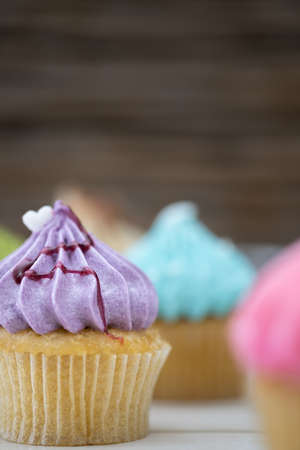 Tasty cupcakes Homemade  muffin  with cream buttercream for birthday, valentine, and christmas holliday.の写真素材