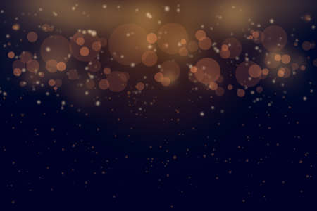 Dark golden abstract bokeh background Christmas and Happy new year on blurred bokeh.の写真素材