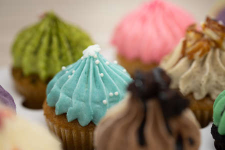 Tasty cupcakes Homemade  muffin  with cream buttercream for birthday, valentine, and christmas holliday.の写真素材