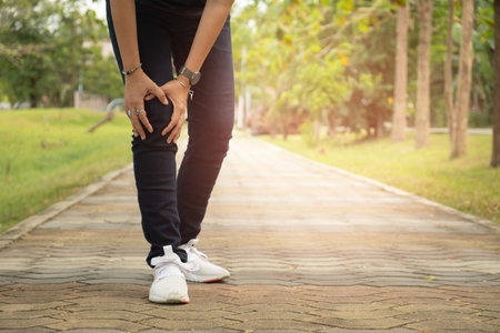 Woman with knee pain, arthrosis of the knee.