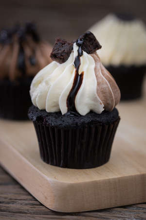 Tasty cupcakes Homemade  muffin  with cream buttercream for birthday, valentine, and christmas holliday.の写真素材