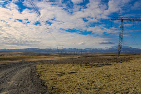 High-voltage transmission line leading through the Icelandic Highlandの写真素材