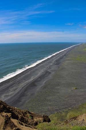 The impressive black sand beach around Dyrholaey in Southern Icelandの写真素材