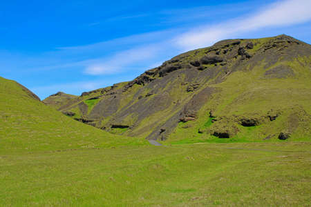 A beautiful unreal landscape around Kvernufoss waterfall in South Iceland, close to the village of Skogarの写真素材