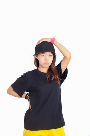 The hip-hop style girl isolated on a white background.の写真素材