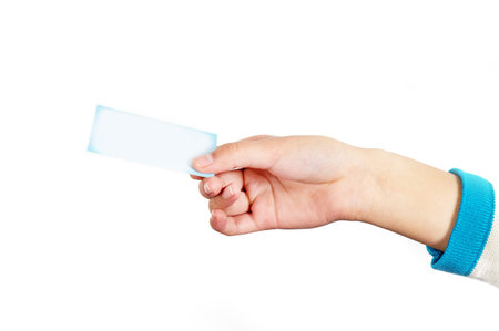 Woman handed blank business card in hand.の写真素材
