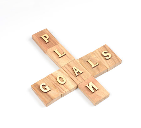 The goal and plan word  on white backgroundの写真素材