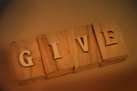 Cutting letters on a square blockの写真素材