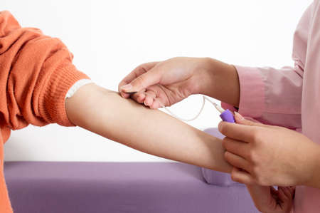 Closeup nurses collected blood samplesの写真素材