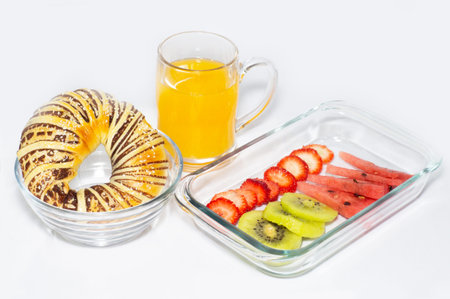 Delicious bread and fruit platter.の写真素材
