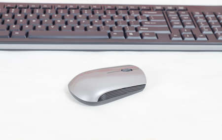 The wireless keyboard and mouse close-up connection.の写真素材