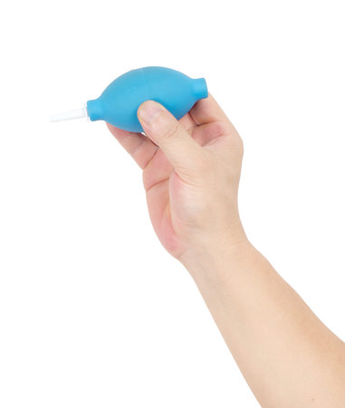 Closeup of a man holding air flushの写真素材