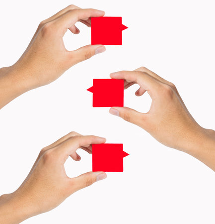 hand holding sale tag or label pages, shallow DOF