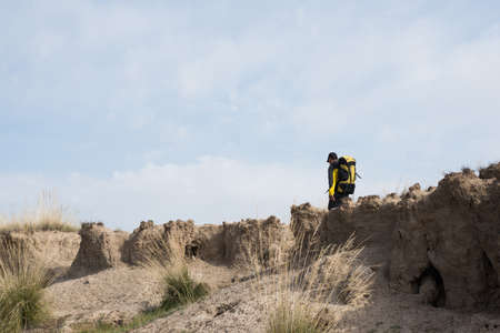 Hikers walking in a steep hill. Asian Youthの写真素材