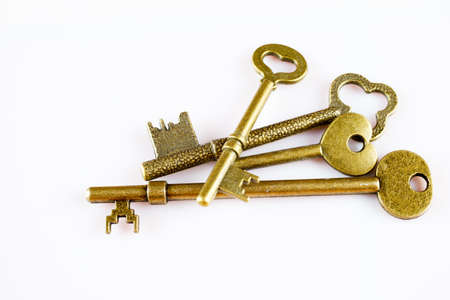 4 retro keys closeup, isolated on white の写真素材