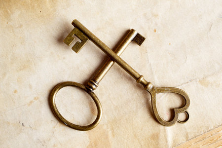 Photo of vintage keys with on textured background