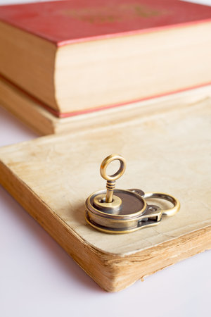 Retro lock and key at the ancient bookの写真素材