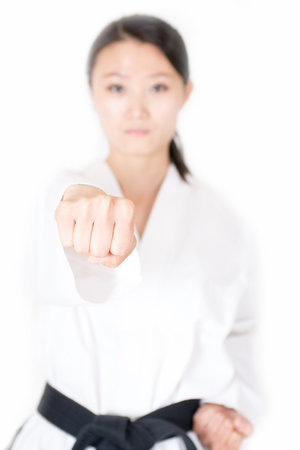 Closeup taekwondo athlete fist. Blur people's faces の写真素材