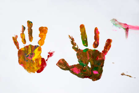 Cute little girl on the paper printed fingerprintsの写真素材