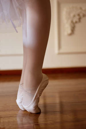 Close up of a ballet dancer performing exercisesの写真素材