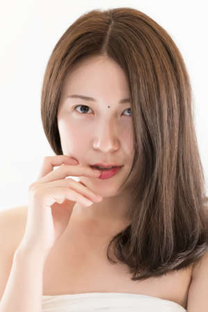 Beauty Portrait. The hand on her lipsの写真素材