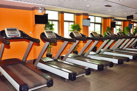 Treadmill equipment in a gym neatly arrangedのeditorial素材