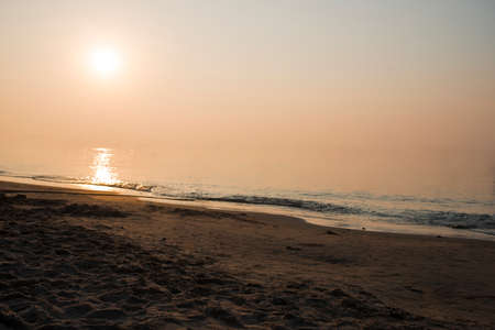 beautiful seascape and sunrise on sky backgroundの写真素材