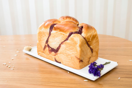 Loaf of  bread on the wooden table