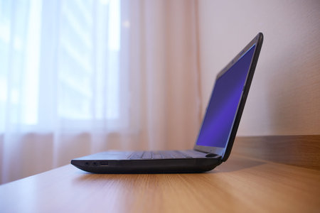 Closeup laptop is on the desk