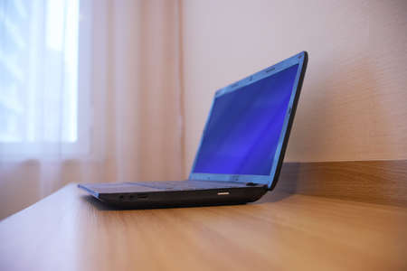 Closeup laptop is on the deskの写真素材