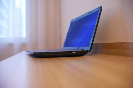 Closeup laptop is on the deskの写真素材