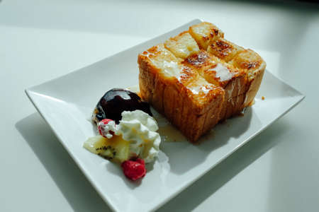 Honey Toast, served with ice-cream and chocolateの写真素材