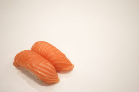 Salmon sushi, isolated in white backgroundの写真素材