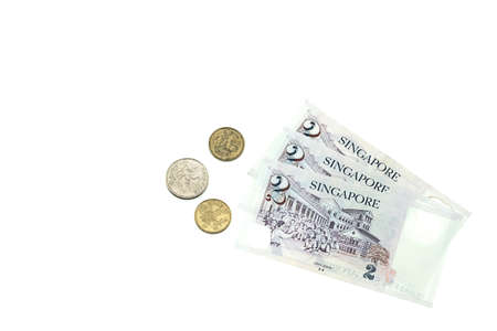 Singapore banknotes and coins isolated on white backgroundの写真素材