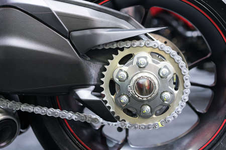 Motorcycle's chain on rear wheelの写真素材