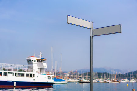 Blank signpost with clipping path at public marina bayの写真素材