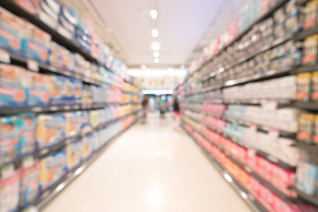 Blurred, bokeh background image of modern supermarketの写真素材