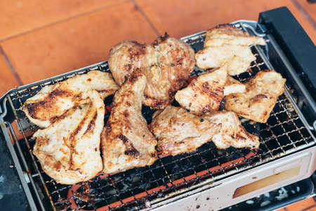 Charred grilling pork tenderloin on electric grillの写真素材