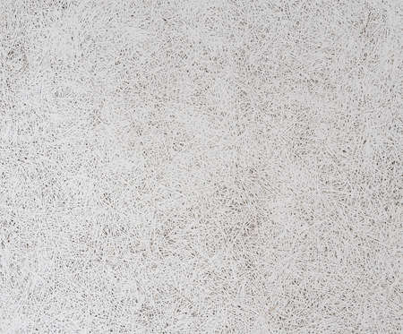 Texture of wallpaper decorated with stripes of rough white paper in random pattern, background useの写真素材