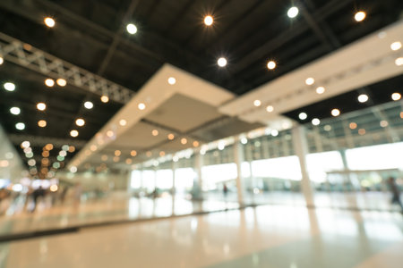 Public event exhibition hall, blurred bokeh defocused background, business trade show or modern...