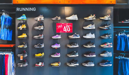 Bangkok, Thailand - Sep 11, 2018: Nike running shoes and sports clothing on 40% promotion price discount shelf at Nike outlet storeのeditorial素材