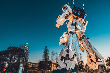 Tokyo, Japan - Jan 9, 2019: Rear view of life-size Unicorn Gundam statue display at DiverCity Tokyo Plaza shopping center in Odaiba. Japanese tourist attraction conceptのeditorial素材