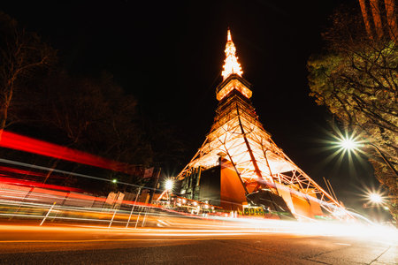 Tokyo tower at night with traffic light trails. Japan iconic symbol, Asia travel destination, Japanese tourism, or tourist attraction conceptのeditorial素材