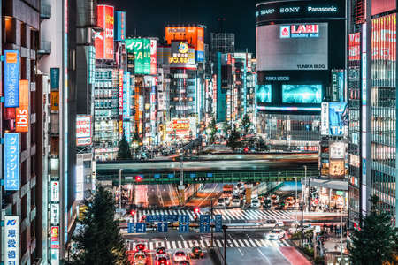 Tokyo, Japan - Nov 1, 2019: Car traffic, train transportation at Kabukicho district in Shinjuku, Tokyo night cityscape high angle view. Japan tourist attraction, Asia tourism, Asian city life conceptのeditorial素材