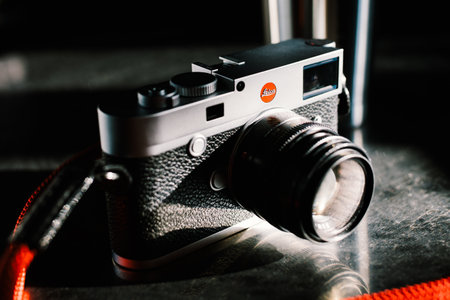 Bangkok, Thailand - Jan 6, 2021: Leica M10 full-frame digital rangefinder camera with Leica 50mm f2 Summicron M-mount lens. Vintage collectible classic camera concept. Illustrative editorial contentのeditorial素材